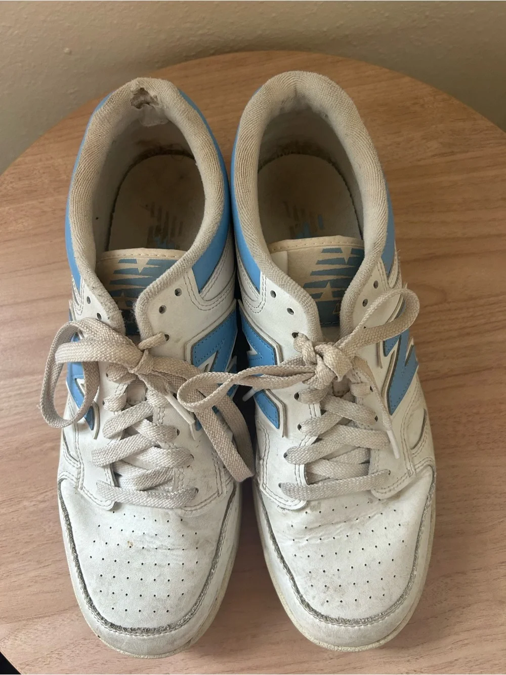 New Balance White Leather Sneakers with Light Blue Logo
